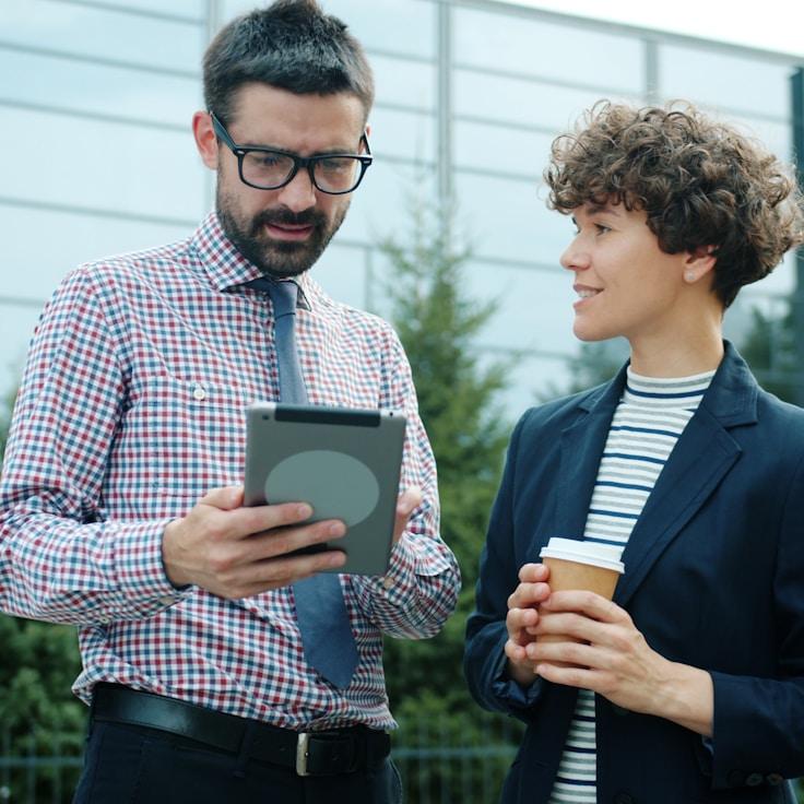 Mobile app project planning workspace with devices and development tools